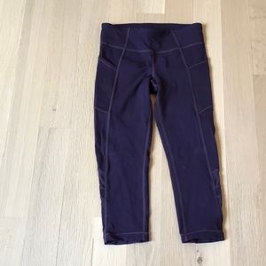 Athleta Girl size 8/10 kids, dark purple leggings.